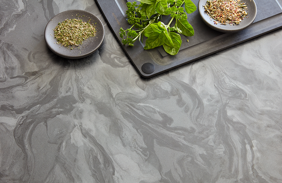 3704-11 Marbled Gray saw artist Kathleen Streitenberger using a pouring medium to virtually paint fluid art, replicating the smooth flowing surface of a marbled piece of paper. This pattern is certain to add personality and creative flair to any space.